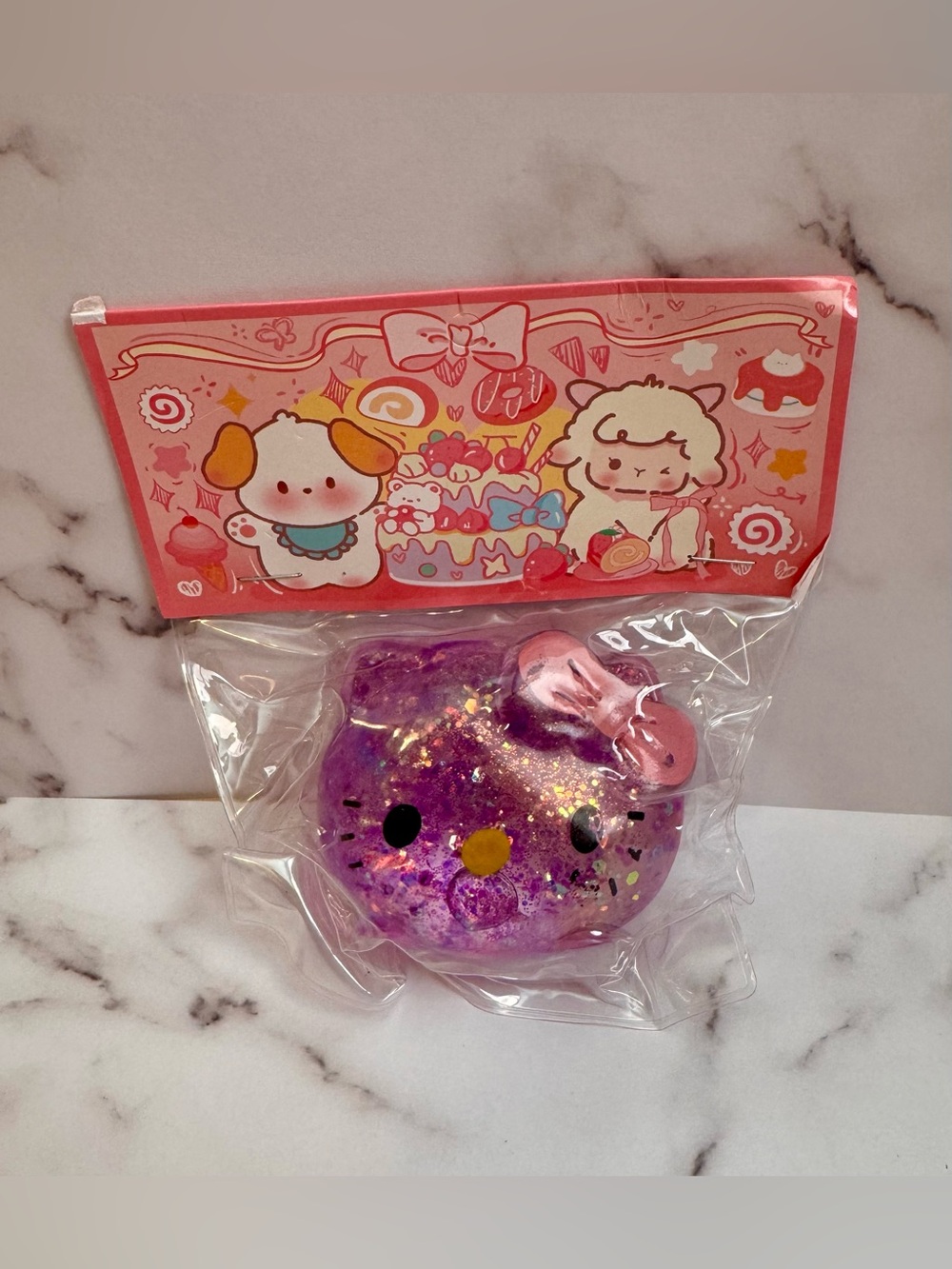 😻Hello Kitty Purple Glitter Squishy with Pink Bow Accent Brand New😻